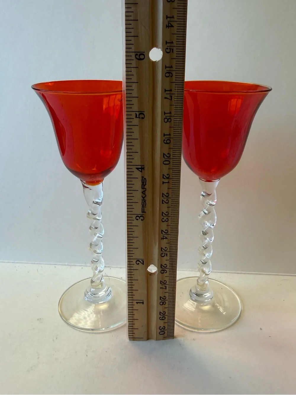 Vintage Pair of Orangy Red Apertif Glassware with Clear Twisted Stems.